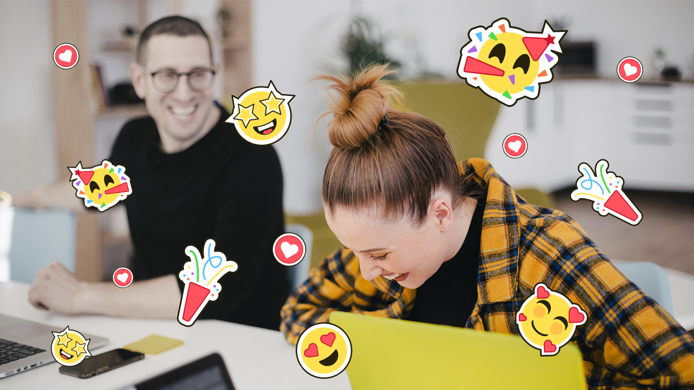 Two people laughing surrounded by emojis